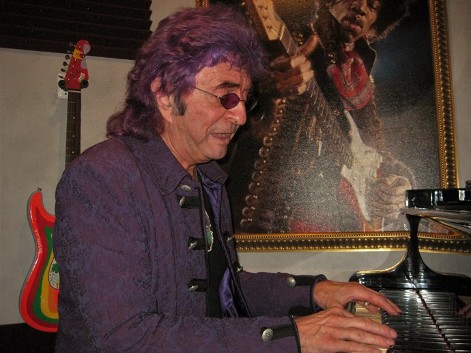 Jim Peterik plays grand piano