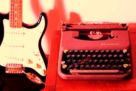 Guitar and typewriter - Moresby Press image